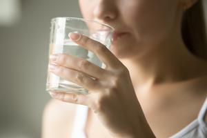 Female drinking from a glass of water