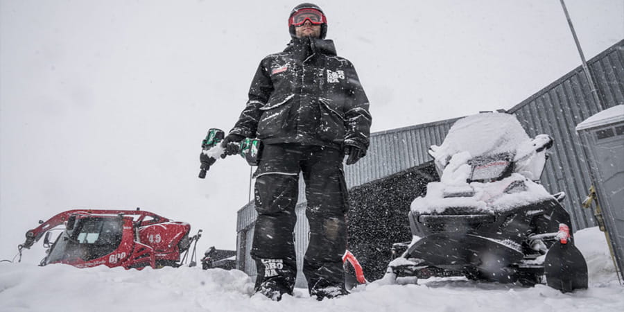Service technician in winter elements uses HiKOKI Power Tools.