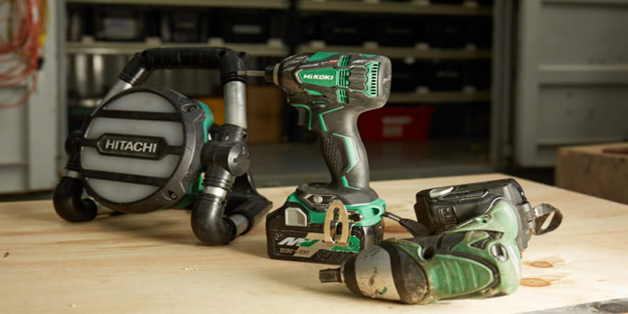 HiKOKI Power Tools displayed on a workbench.