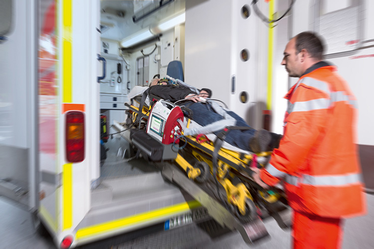 Patient getting into the ambulance